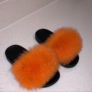 Girls orange fur slides